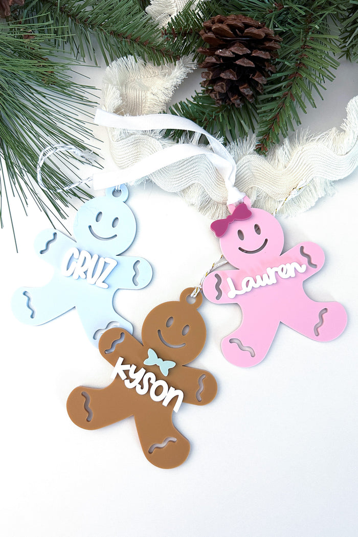 Gingerbread ornament options shown: boy, girl, and plain – personalized holiday decor | Buffy + Coco